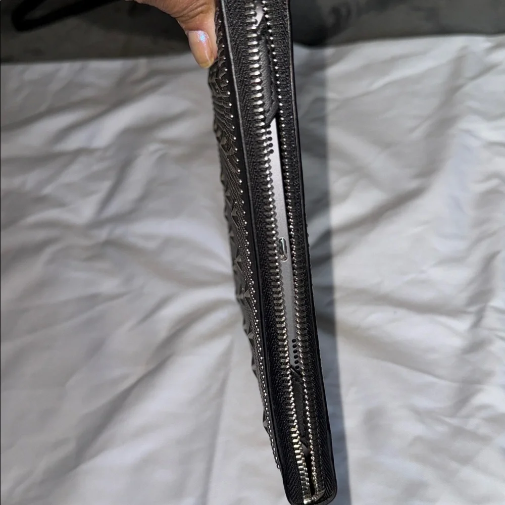 Jimmy Choo Black Leather Pouch with Silver Accents